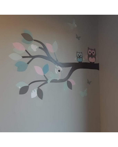 Muursticker kinderkamer uilentak groen roze blauw in spiegelbeeld.