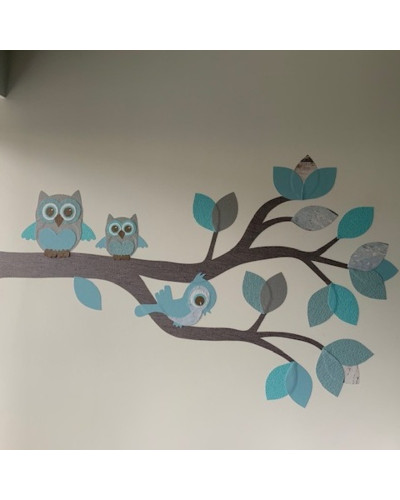 Behang muursticker sierlijke uilentak kinderkamer in de kleur lichtblauw.