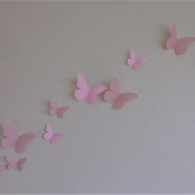 Behang muursticker 3d vlinders  roze.