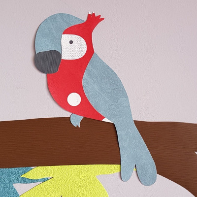 Muursticker behang papegaai rood/groen.