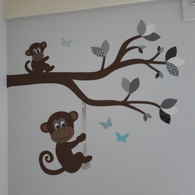 Behang muursticker babykamer losse sierlijke tak met apen.
