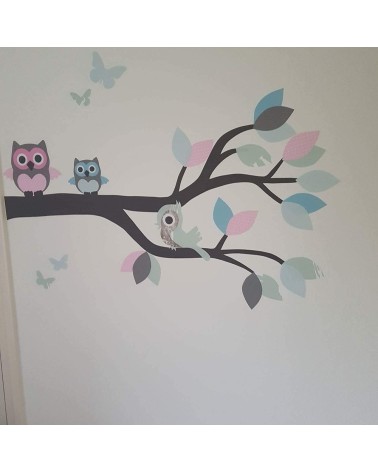 Behangsticker babykamer sierlijke uilentak mintgroen roze en blauw.
