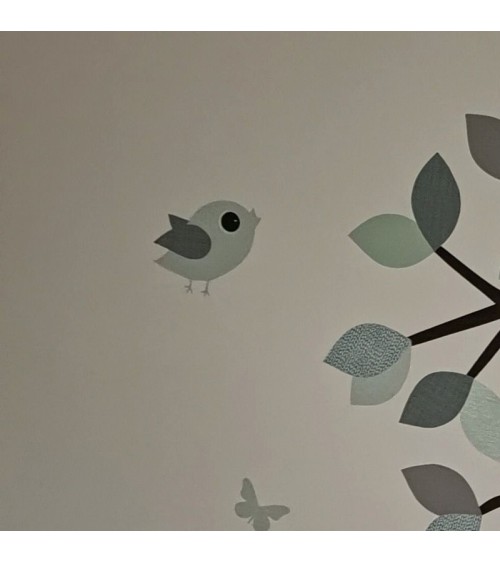 Behang muursticker vliegend vogeltje fel roze.