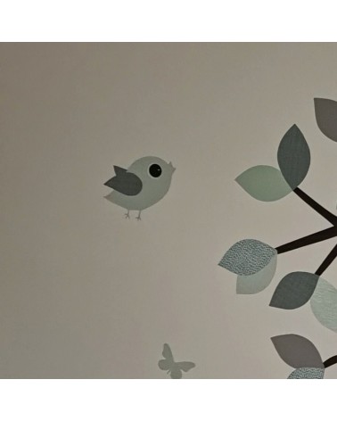Behang muursticker vliegend vogeltje mintgroen.