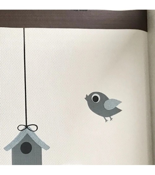 Behang muursticker vliegend vogeltje fel roze.