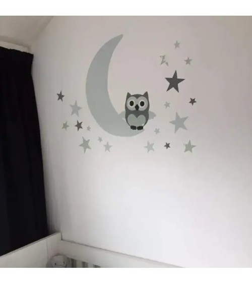 Behang sticker babykamer uiltje op de maan met sterren in mintgroen en okergeel.