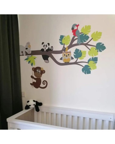 Behangmuursticker jungletak babykamer felle kleuren.