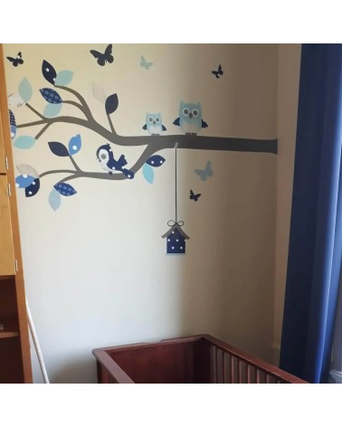 Behangsticker sierlijke uilentak jongens babykamer blauwtinten.