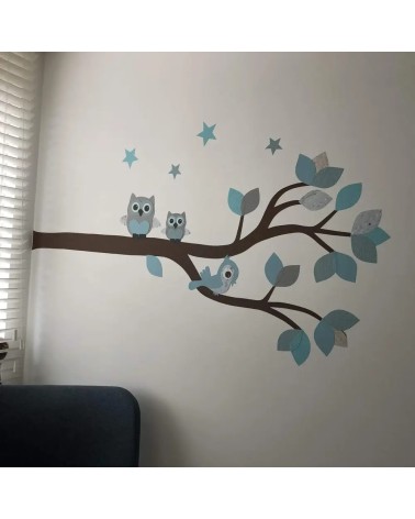 Behangsticker sierlijke uilentak lichtblauw met sterren.