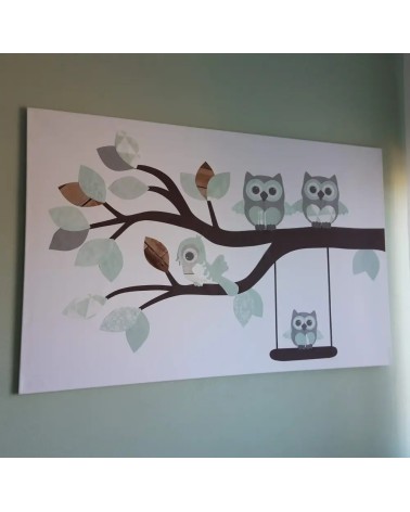 Behangsticker babykamer sierlijke uilentak mintgroen op canvasdoek.