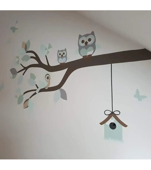 Behangsticker babykamer tak met uiltjes mintgroen.
