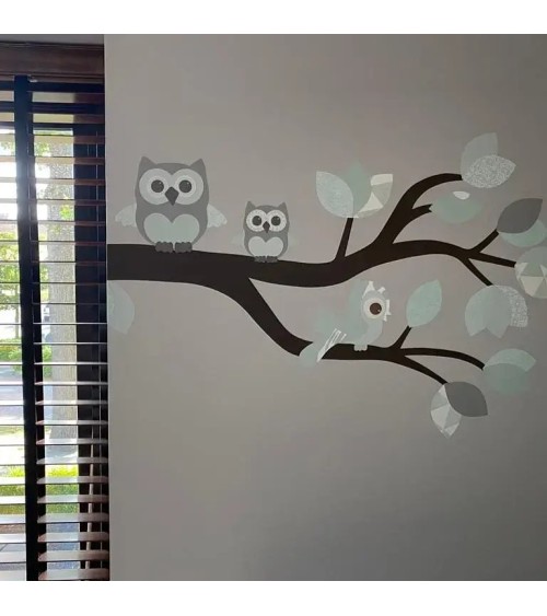 Behangsticker babykamer tak met uiltjes mintgroen.