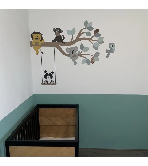 Behang muursticker babykamer losse sierlijke tak okergeel met indianen uil.