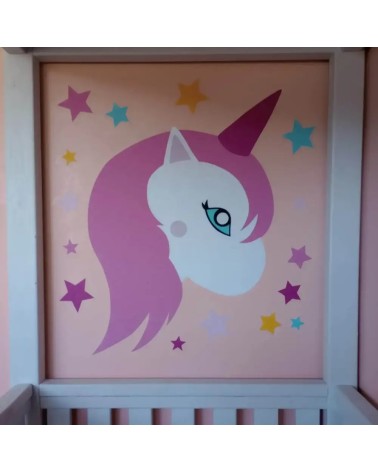Behangsticker unicorn roze met sterren meisjeskamer.