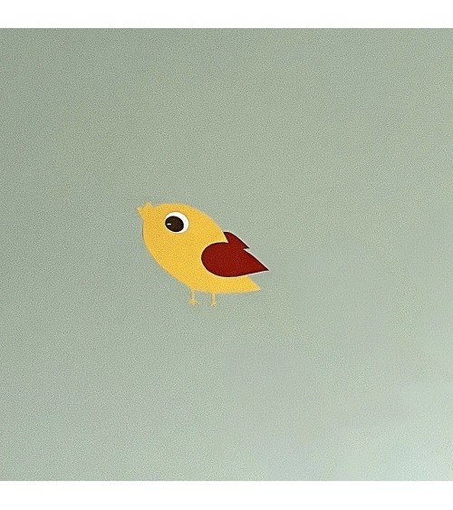 Behang muursticker vliegend vogeltje fel roze.