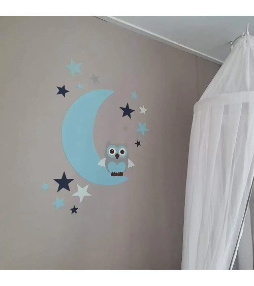Behang muursticker babykamer uil op de maan met sterren lichtblauw