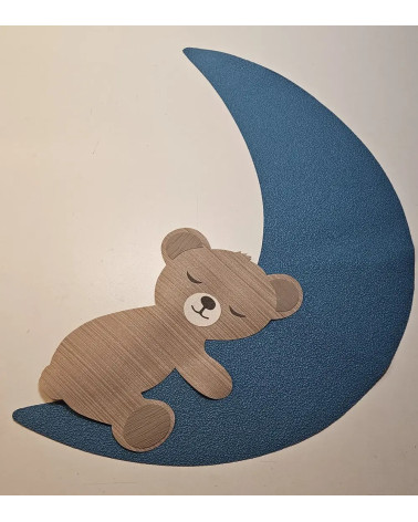 Behangsticker babykamer slapende teddybeer op een petrol maan.