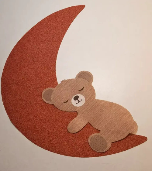 Behangsticker babykamer donkergroene maan en sterren met een slapend teddybeertje.