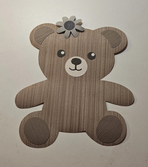 Behangsticker zittend teddybeertje muurdecoratie babykamer.