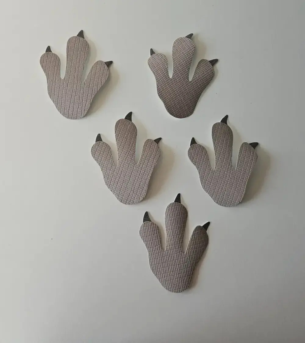 Set behangstickers dino pootafdrukken.