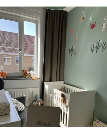 Voorbeeldfoto oceaan behangstickers voor de babykamer en kinderkamer met het onderwaterwereld thema.