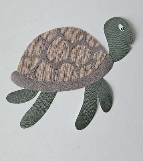 Behangsticker schildpad babykamer.