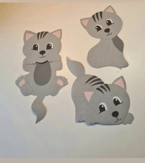 Behangsticker spelende poes.