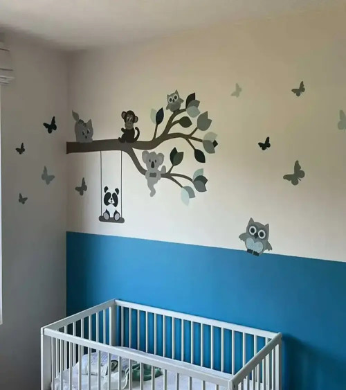 Behangsticker spelende poes.