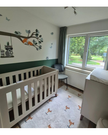 Behangsticker tak met bosdieren babykamer groen.