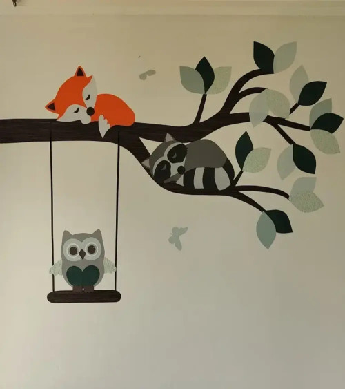Behangsticker tak met bosdieren babykamer groen.