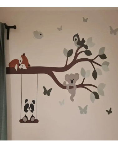 Behangsticker babykamer tak met vrolijke dieren groen