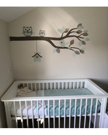 Behangsticker babykamer tak met uiltjes mintgroen.
