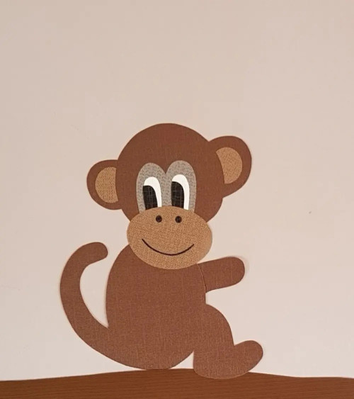 Behangsticker aapje opzij staart links.