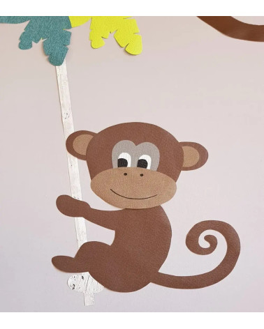 Behangsticker jungle kamer aap aan touw slingerend