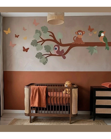 Behangsticker kinderkamer jungletak met jungledieren in aardetinten en grounding kleuren.