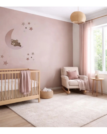 Behangsticker babykamer slapende teddybeer op een oudroze maan.