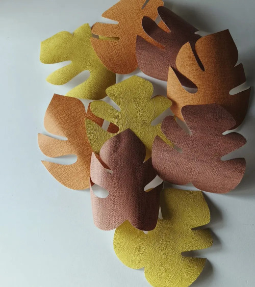 set jungle bladeren in roest, terracotta, oranje roest en okergeel.