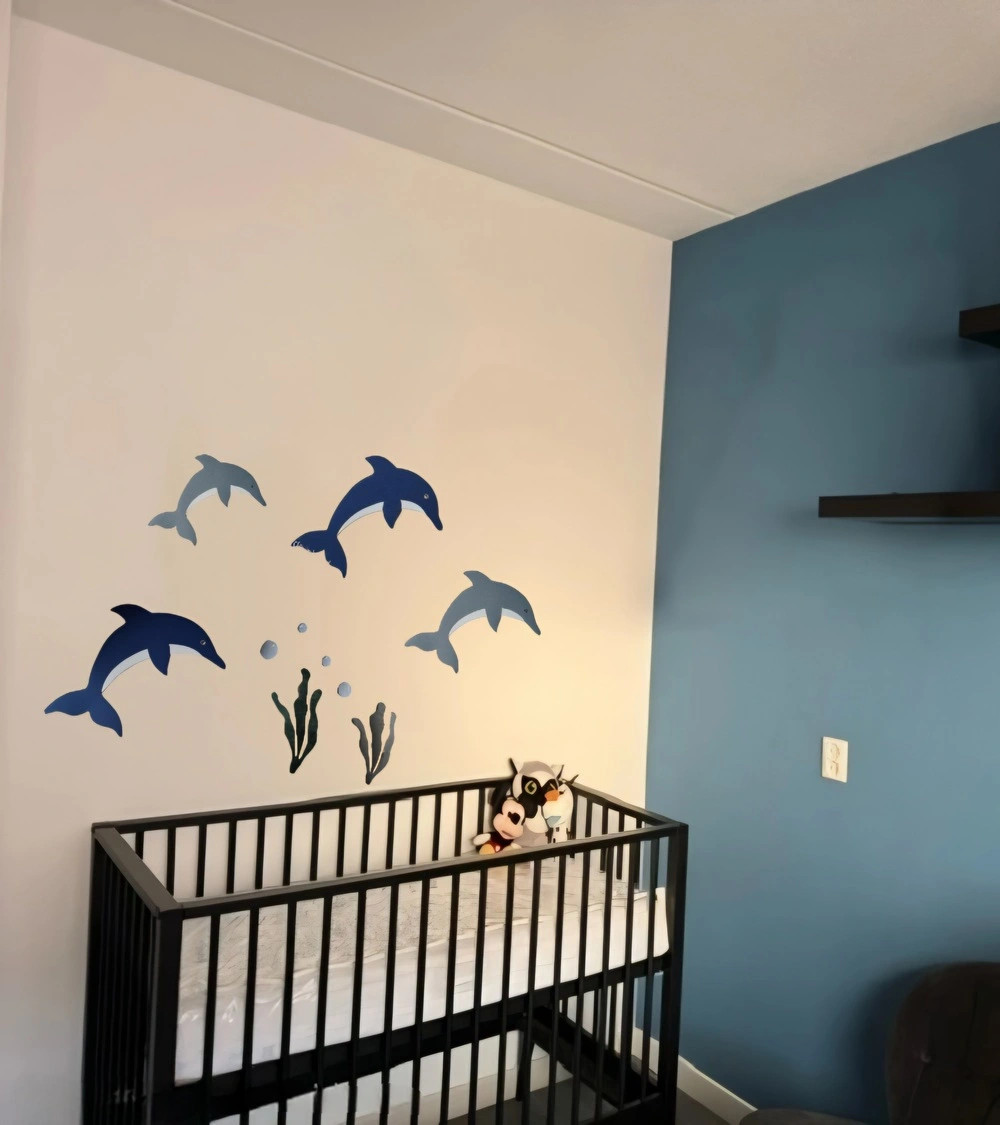 Set dolfijnen behangstickers jongenskamer in blauw en grijs.