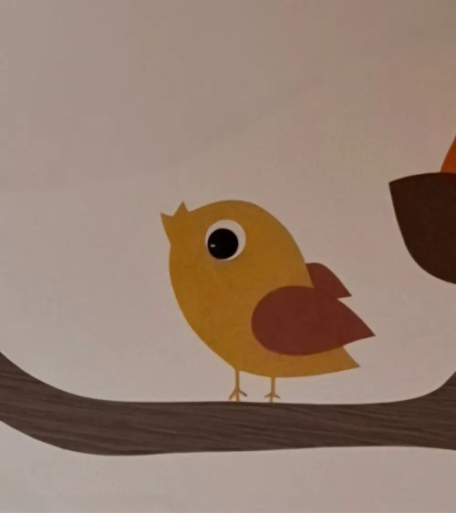 Behangsticker vliegend vogeltje okergeel.