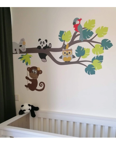 Behangmuursticker jungletak babykamer felle kleuren.