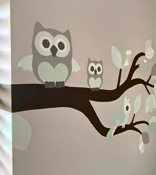 Sierlijke uilentak mintgroen muursticker babykamer.