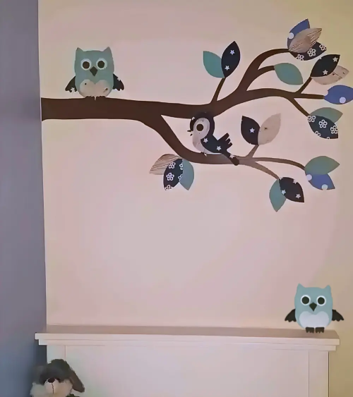 Jongenskamer muurdecoratie uiltjes en vogel op een boomtak in blauwe kleurtinten.