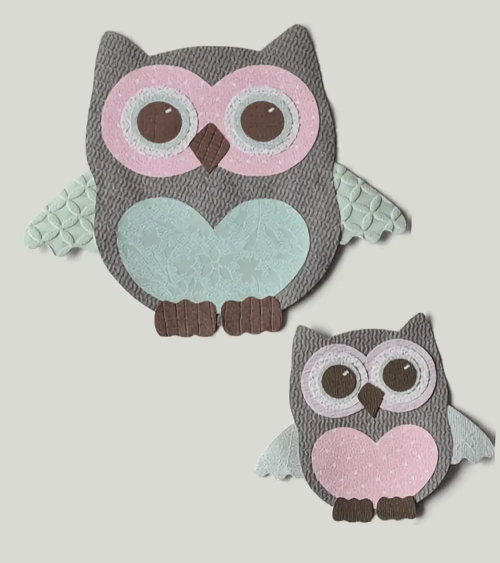 Behangsticker babykamer uil groot mintgroen en roze.