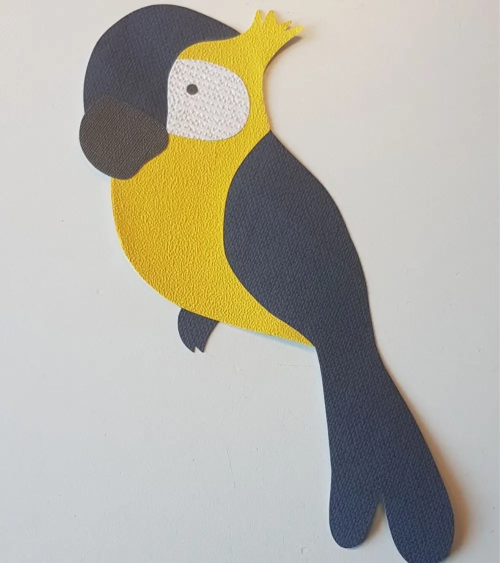 Behangsticker kinderkamer papegaai donkerblauw en okergeel.