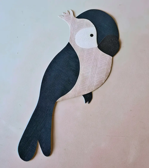 Behangsticker kinderkamer papegaai oudroze en blauw.